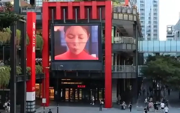 K-Food ad on a framed LED screen at a shopping centre entrance in Taiwan