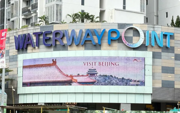 Visit Beijing tourism ad on the large LED screen at Waterway Point, Singapore